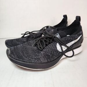 Nike Black Knit Sneakers with White Swoosh